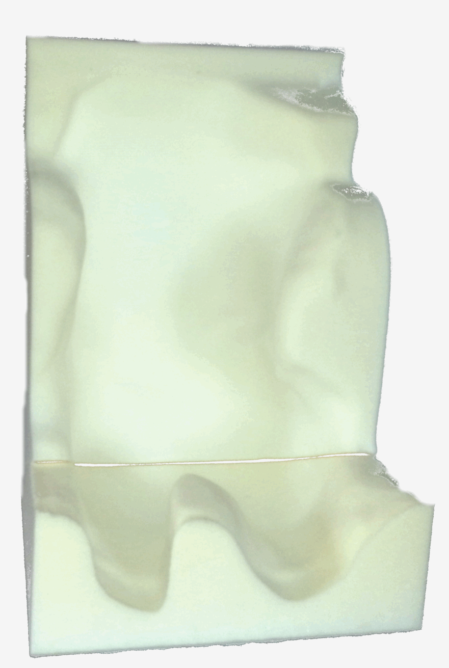 Illustration einer kindgerechten Sitzschale mit Pelotten und Kopfstütze